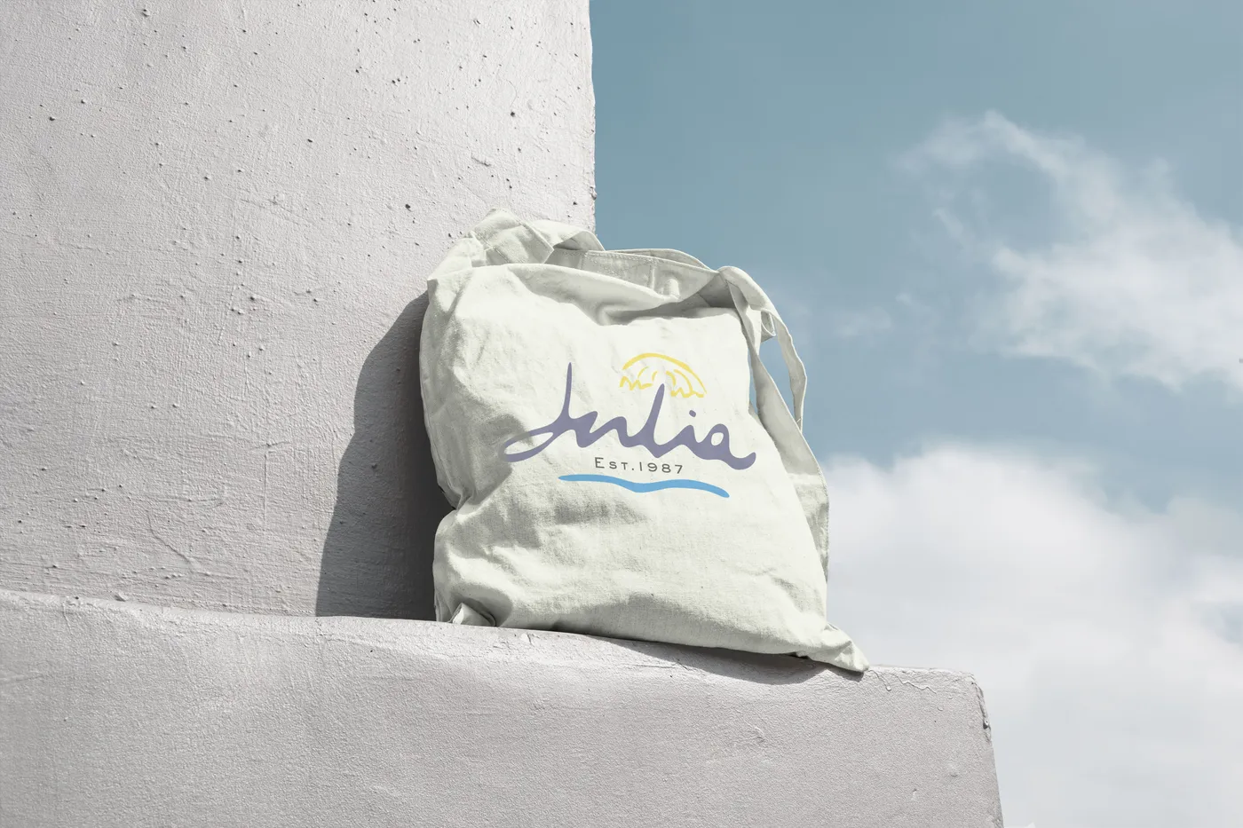 H4 mockup: Natural tote, against the sky